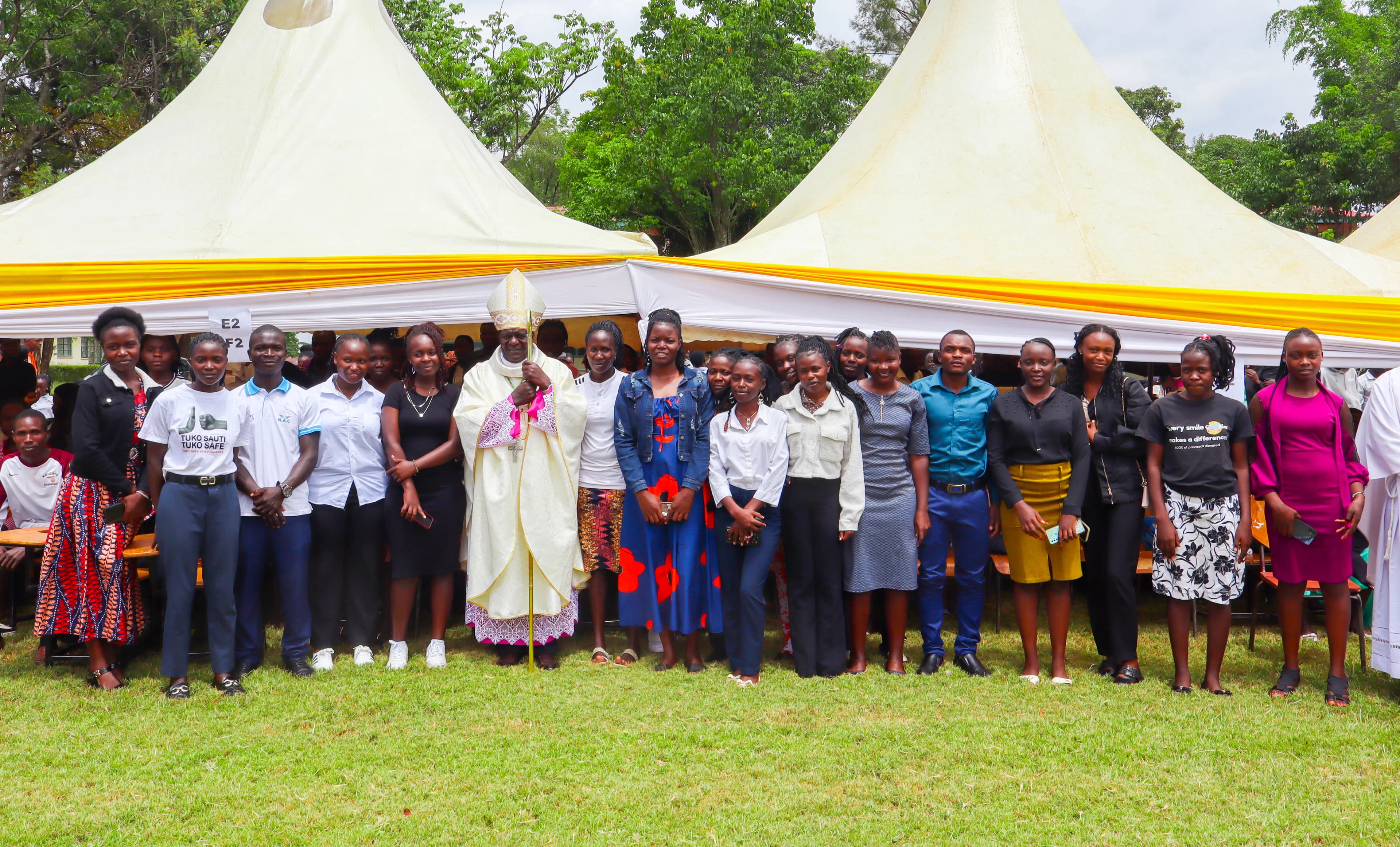 Teacher trainee with the College Bishop at St. Augustine TTC - Eregi